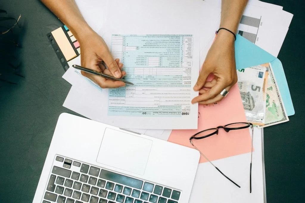Someone filling out tax papers